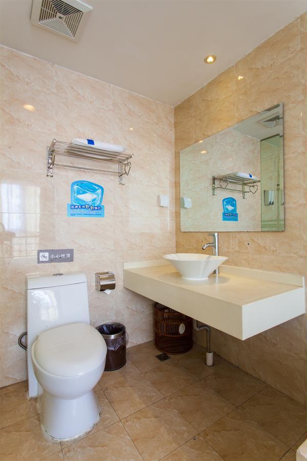 7Days Inn Qingdao Development Zone Jinshatan Номер фото
